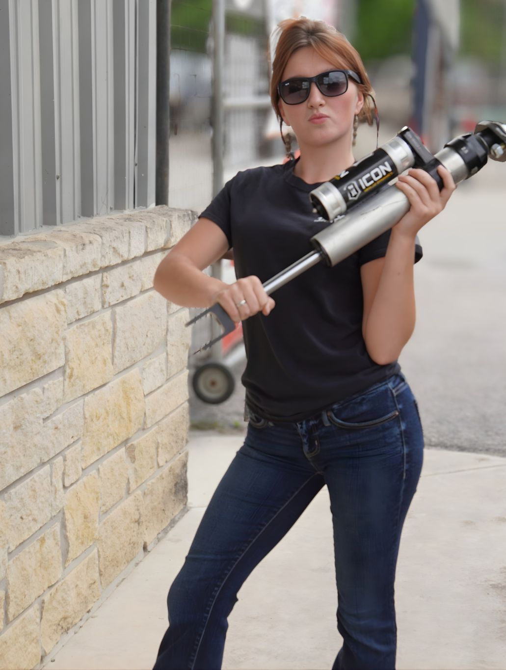 Texas Complete Truck Center Technician Holding Truck Shock Absorber | Texas Complete Truck Center