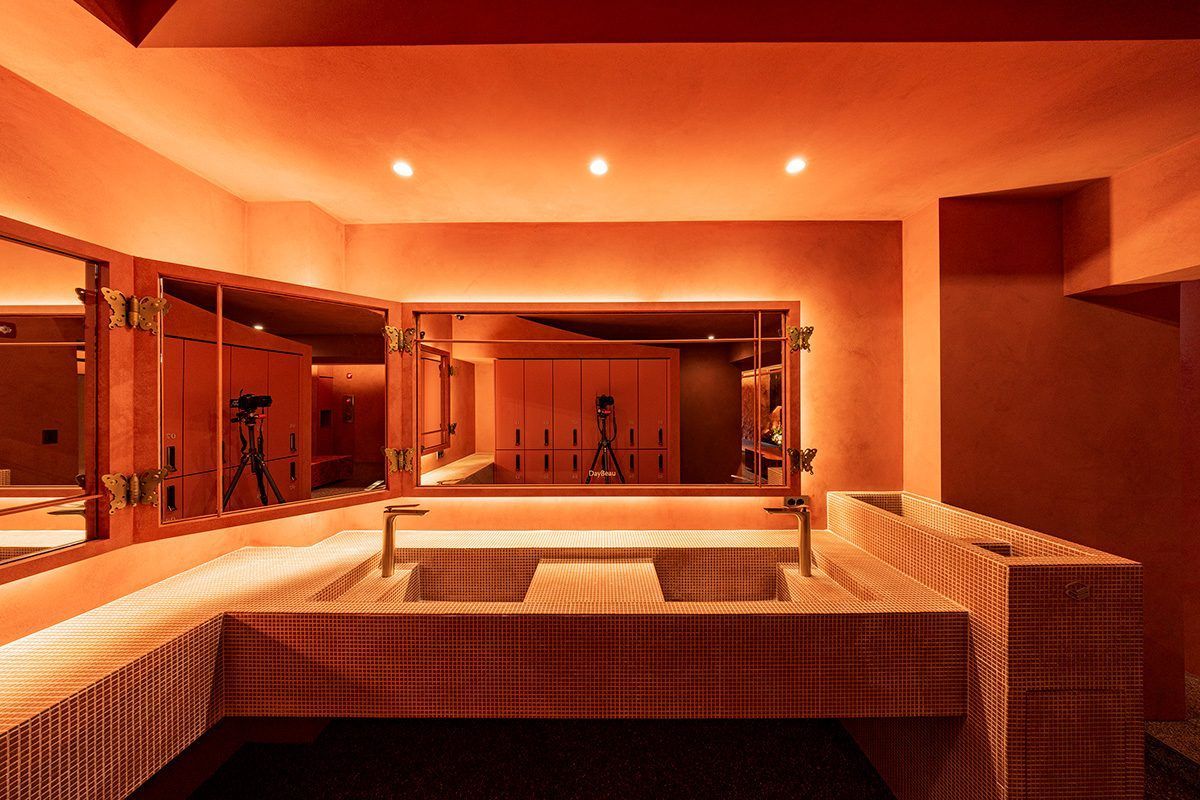 Consultation space in warm vermilion light