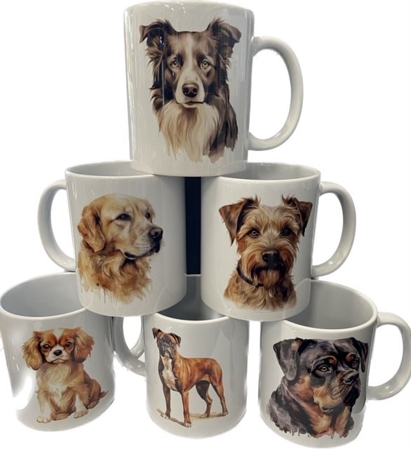 a stack of coffee mugs with dogs on them