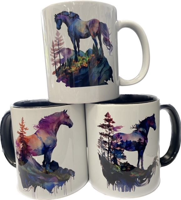 three coffee mugs with horses on them are stacked on top of each other .