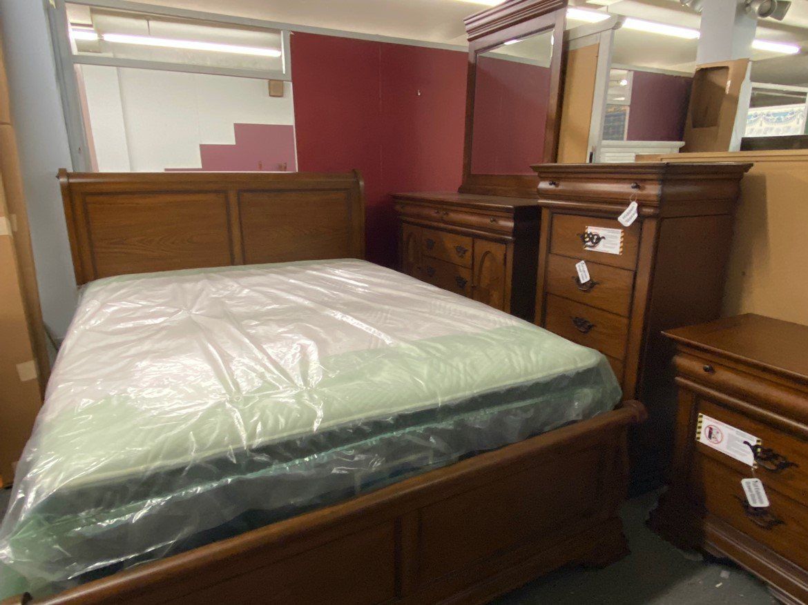 Bed With Plastic Cover — Rocky Mount, NC — Viverette Furniture Inc