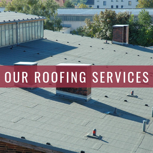 A flat, gray industrial rooftop with chimneys and ventilation pipes, overlaid with the text