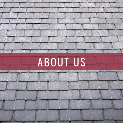A gray slate roof background with a horizontal maroon banner across the center containing the white text,