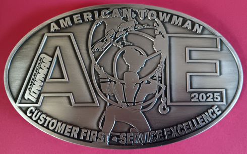 Belt buckle, American Towman. Silver with 