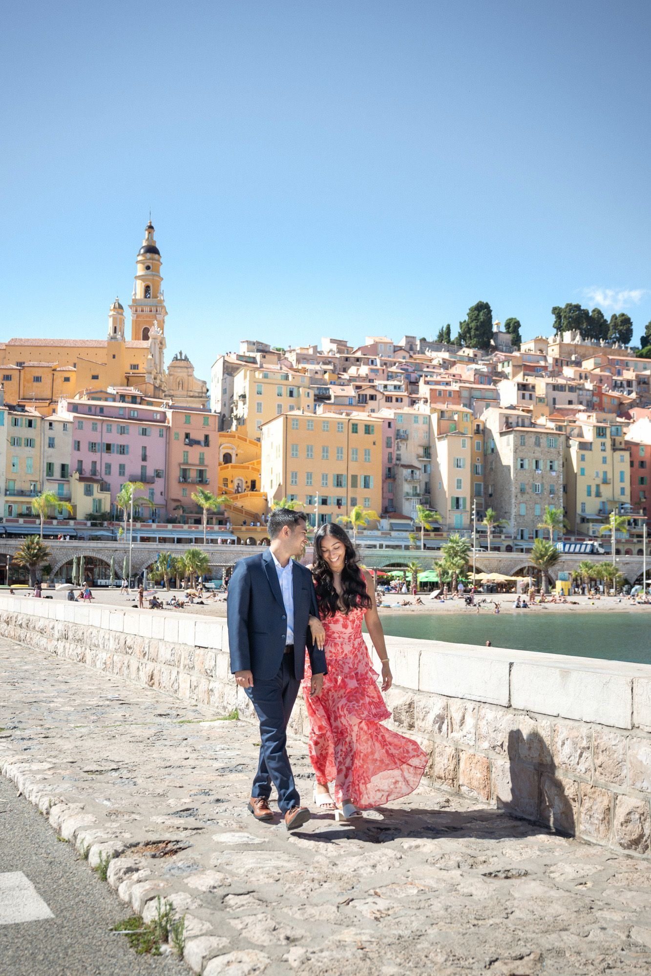 A candid, natural romantic photograph during a couple photoshoot in Menton, South of France.