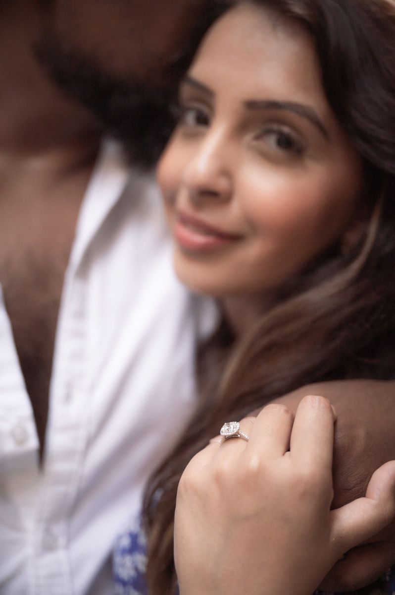 An engagement ring on display during a photoshoot