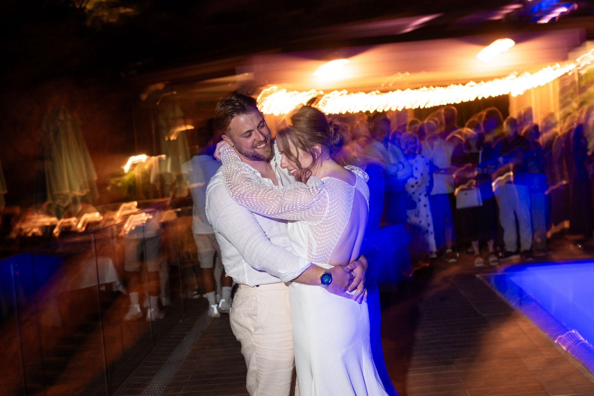 The couple's first dance at night time after their destination wedding at the The Tiara Miramar Beach Resort hotel.