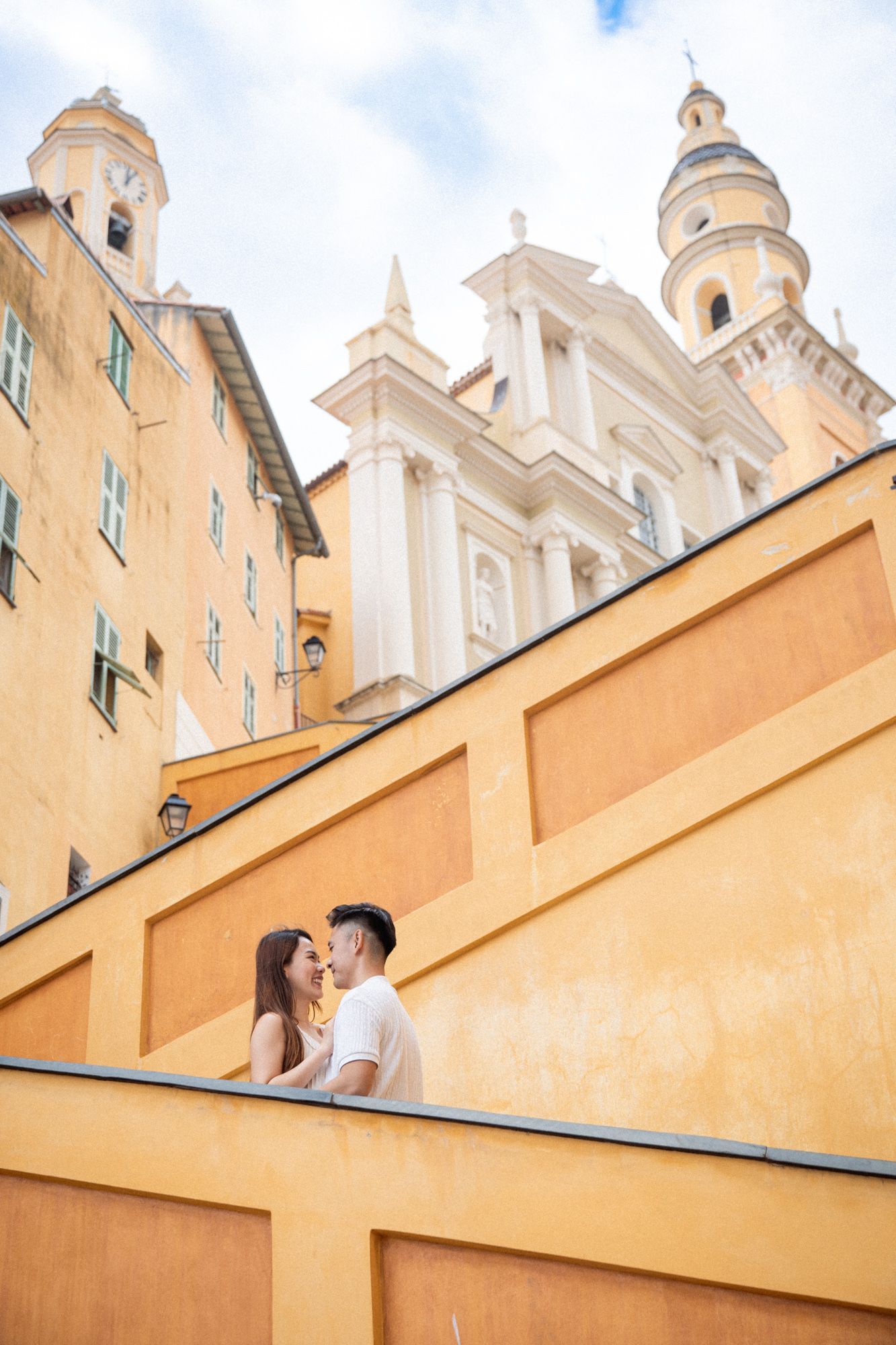 A wide photograph of Menton's yellow stairs.