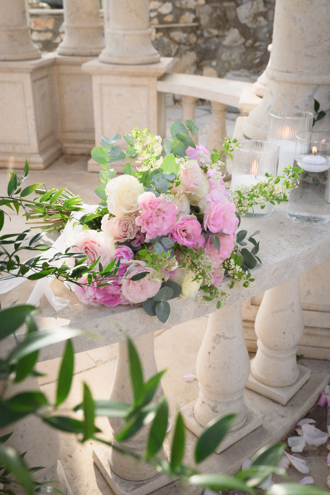 The Temple of Love proposal location in Eze with flower and candle display.