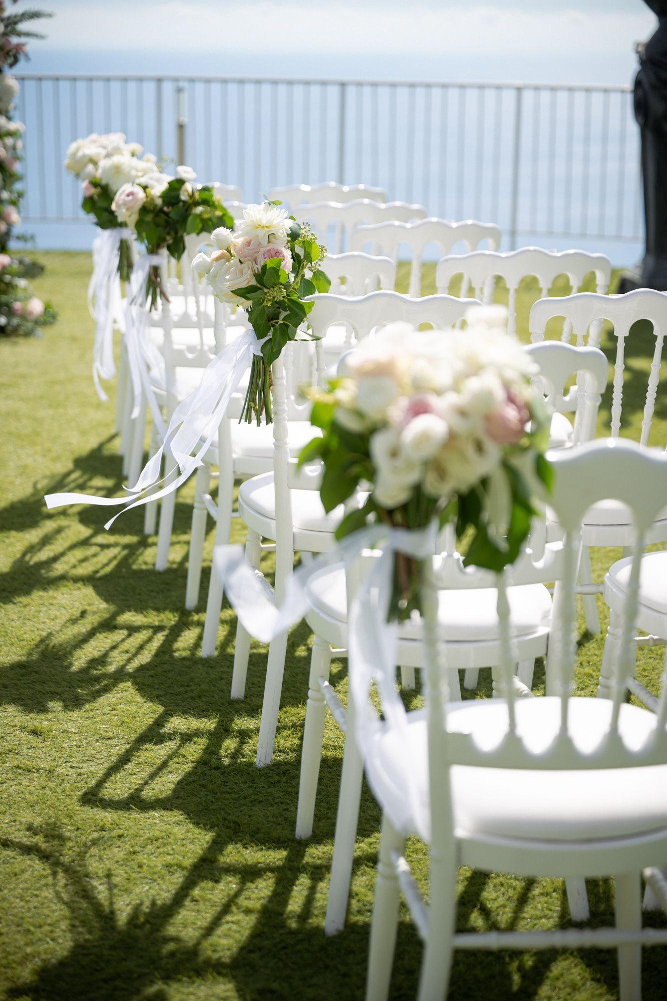 Flowers and chairs at a wedding ceremony at the Rose Terrace