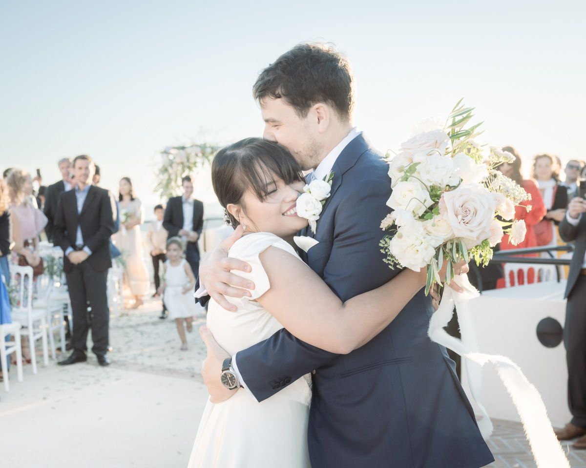 couple hug after their wedding ceremony