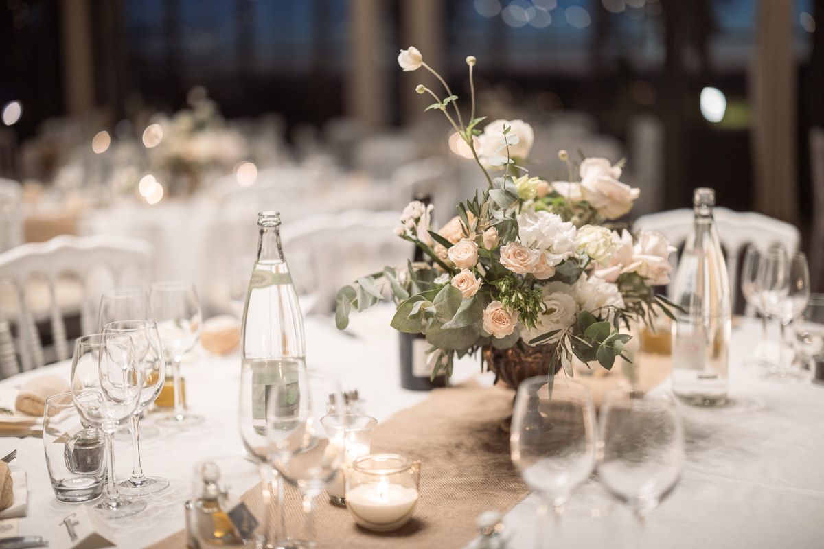 table display flowers on a wedding day at Chateau Crémat