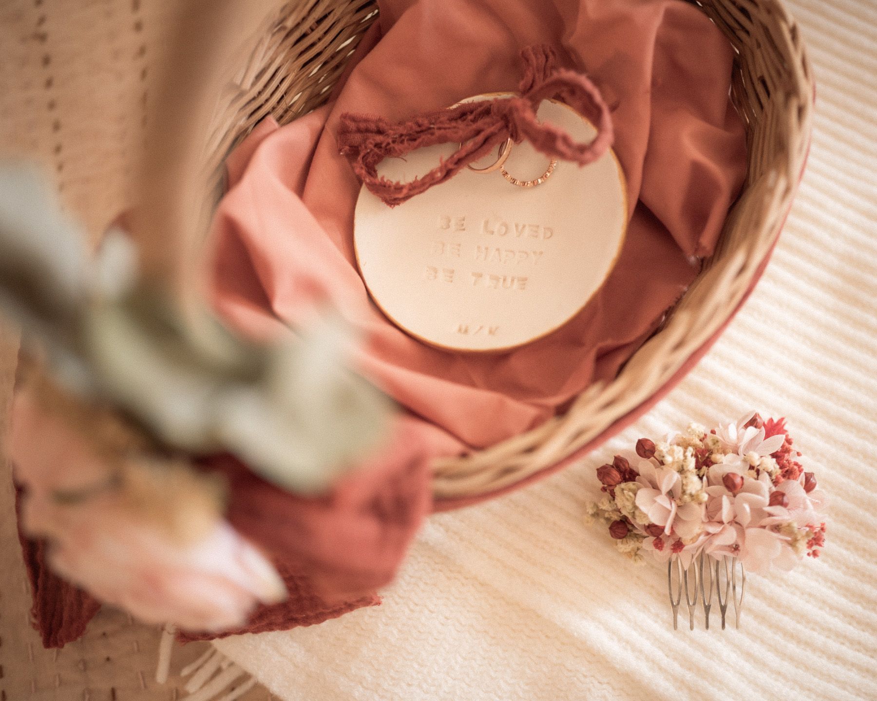 details of wedding rings and hair pin