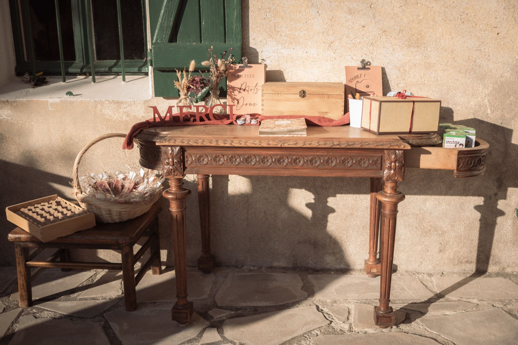 A table full of wedding guest gifts and activities