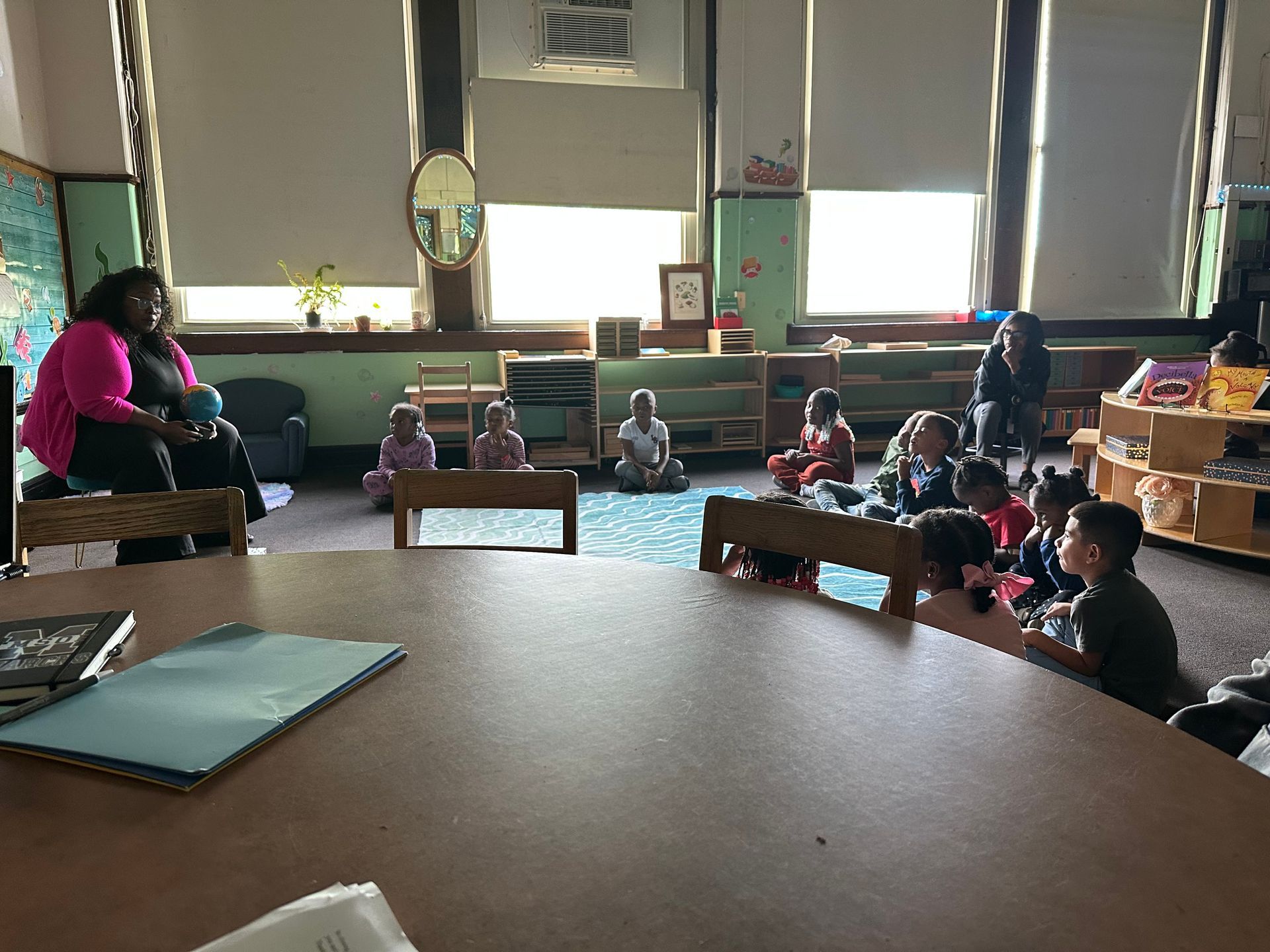 Montessori guide and child