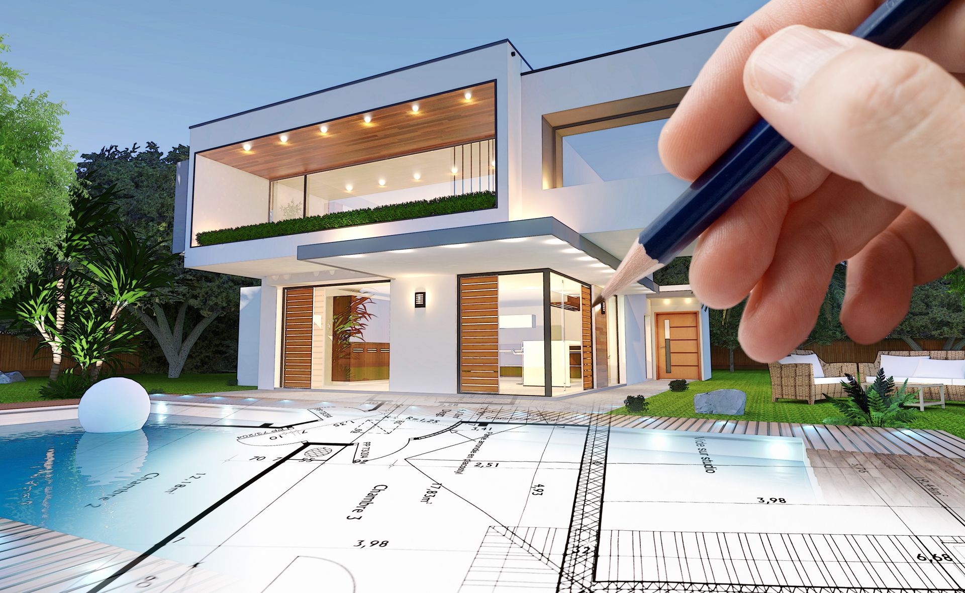 Drawing a House on a Blueprint With a Pencil