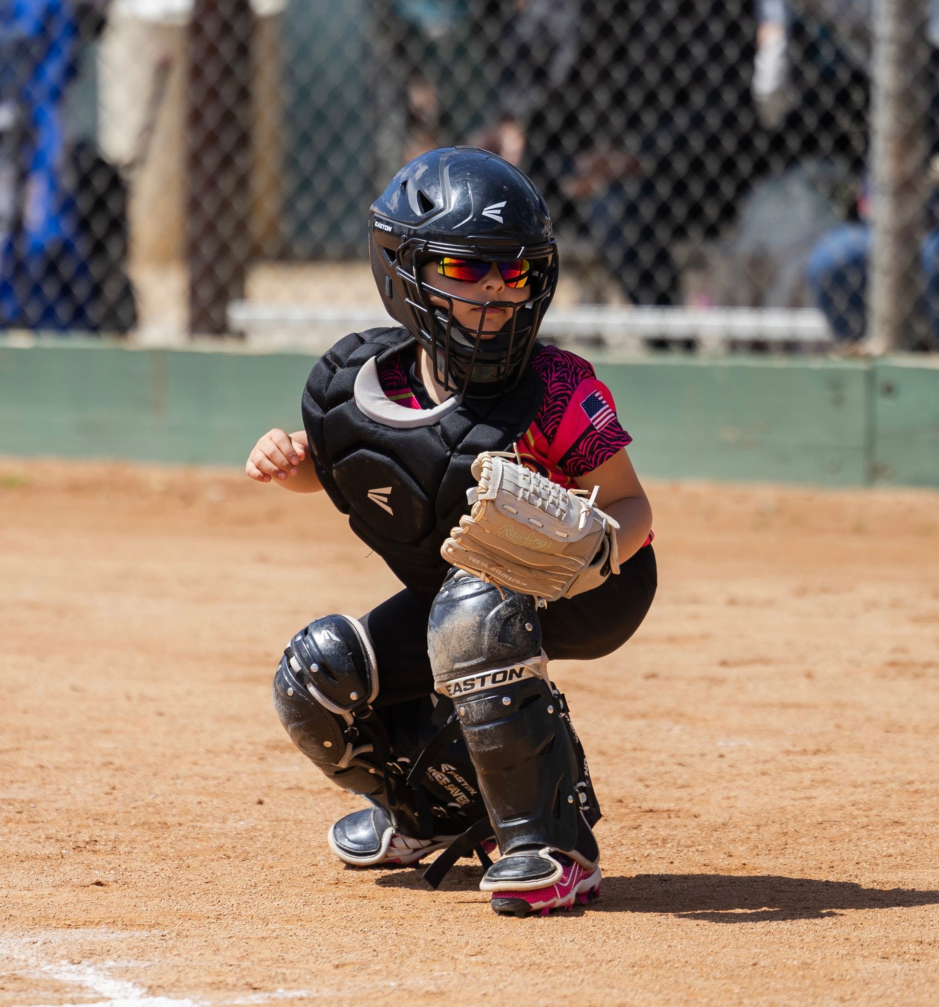 Baseball on a dark surface, with visible stitching.