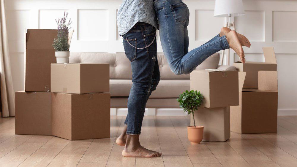 A couple Moving into Their New Home — Mortgage Brokers In Mundingburra, QLD