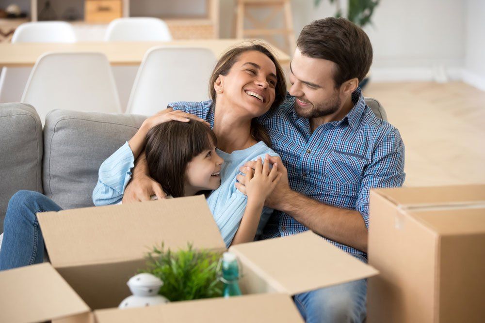 Family On Couch — Mortgage Brokers In Mundingburra, QLD