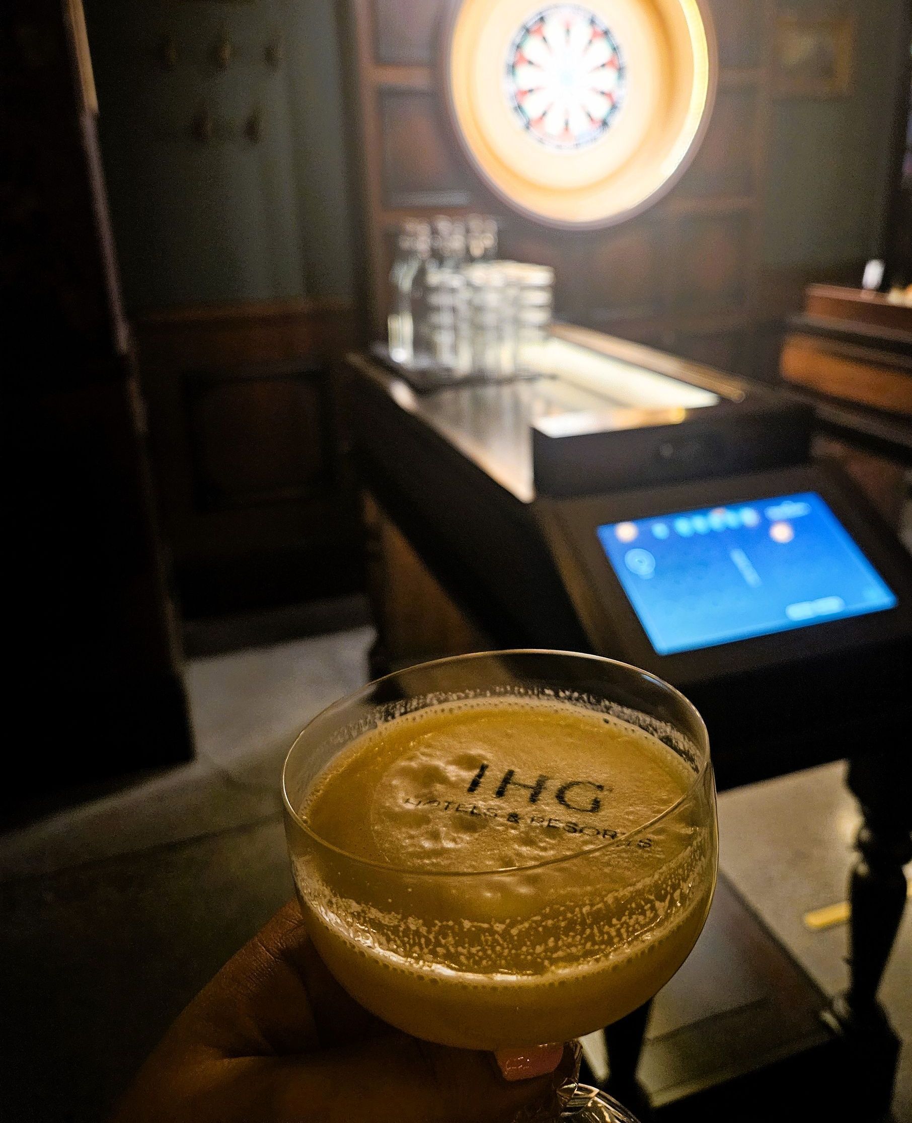 A person holds a cocktail with