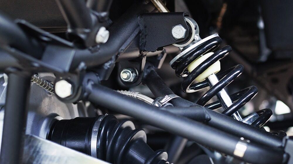 A Close Up Of A Shock Absorber On A Vehicle — JBS Mobile In Ballina, NSW