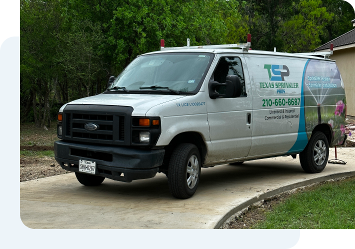 A ford van is parked on the side of the road.