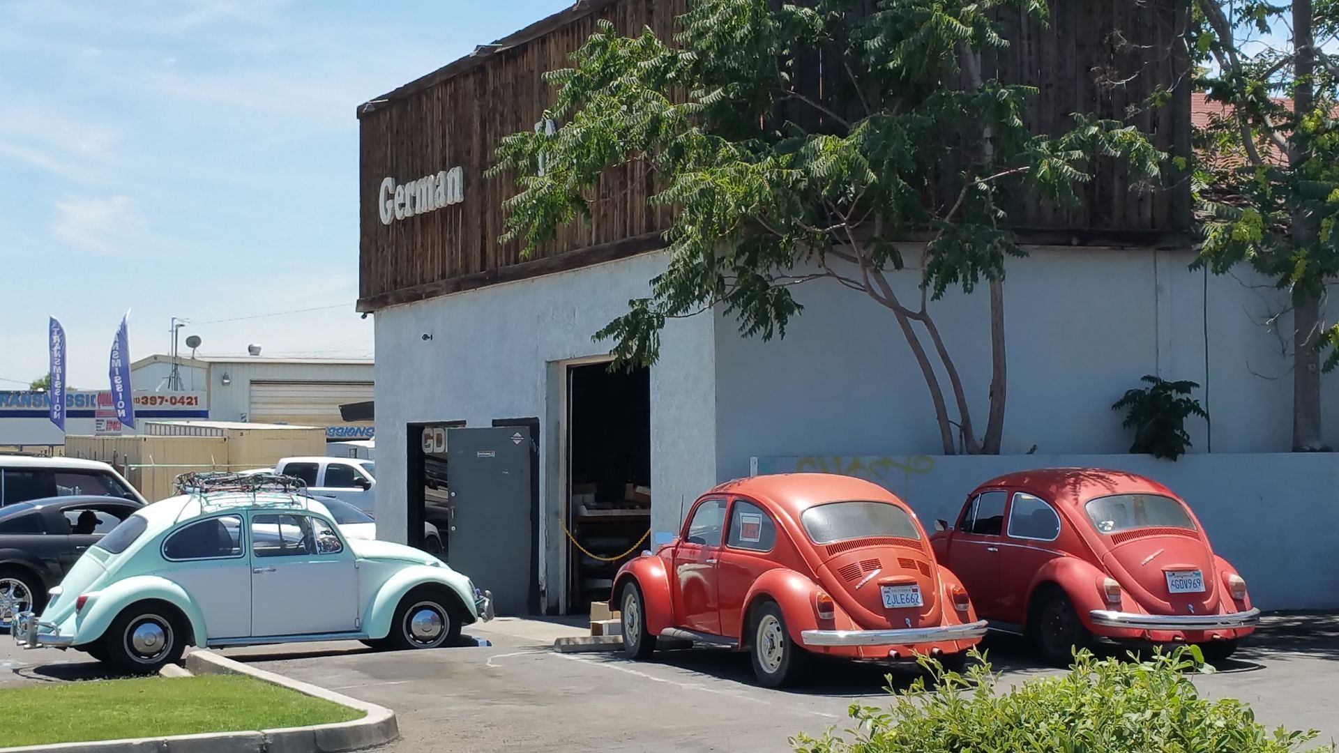 Retro Vehicles Parked in the Shop Front | German Dreams