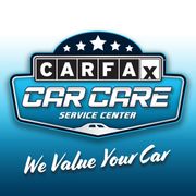 Carfax Car Care logo on a blue background: text, stars, and a car silhouette.