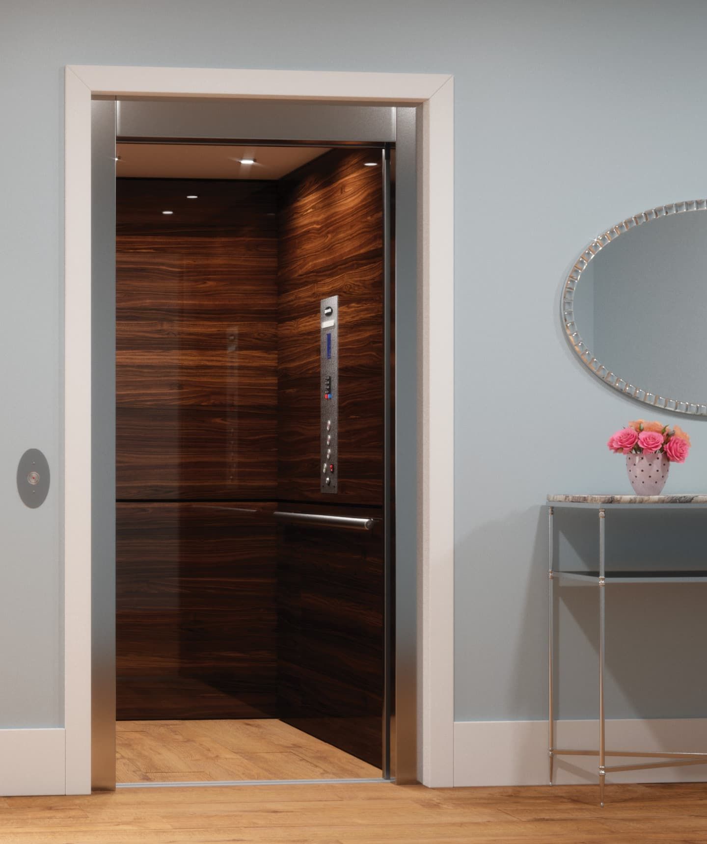 Elevator with dark wood paneling, open in a light blue room with a side table and oval mirror.