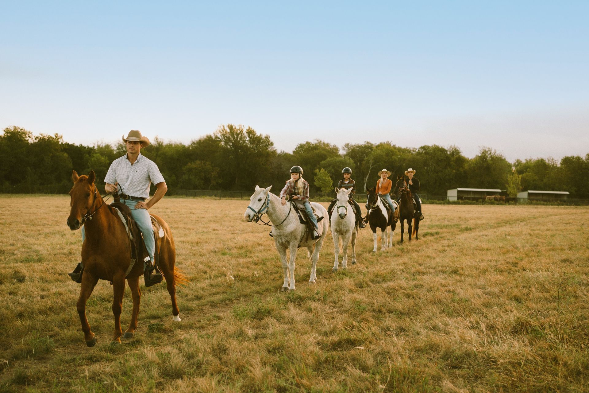 Beginner horseback riding on a trail near Waco, Texas