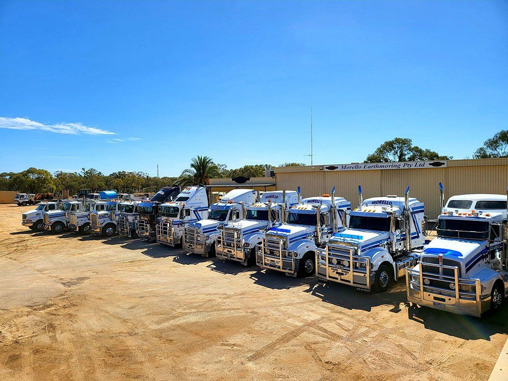 Parked Trucks — Mildura, VIC — Morello Earthmoving Pty Ltd