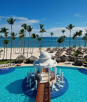 A large swimming pool with a gazebo in the middle