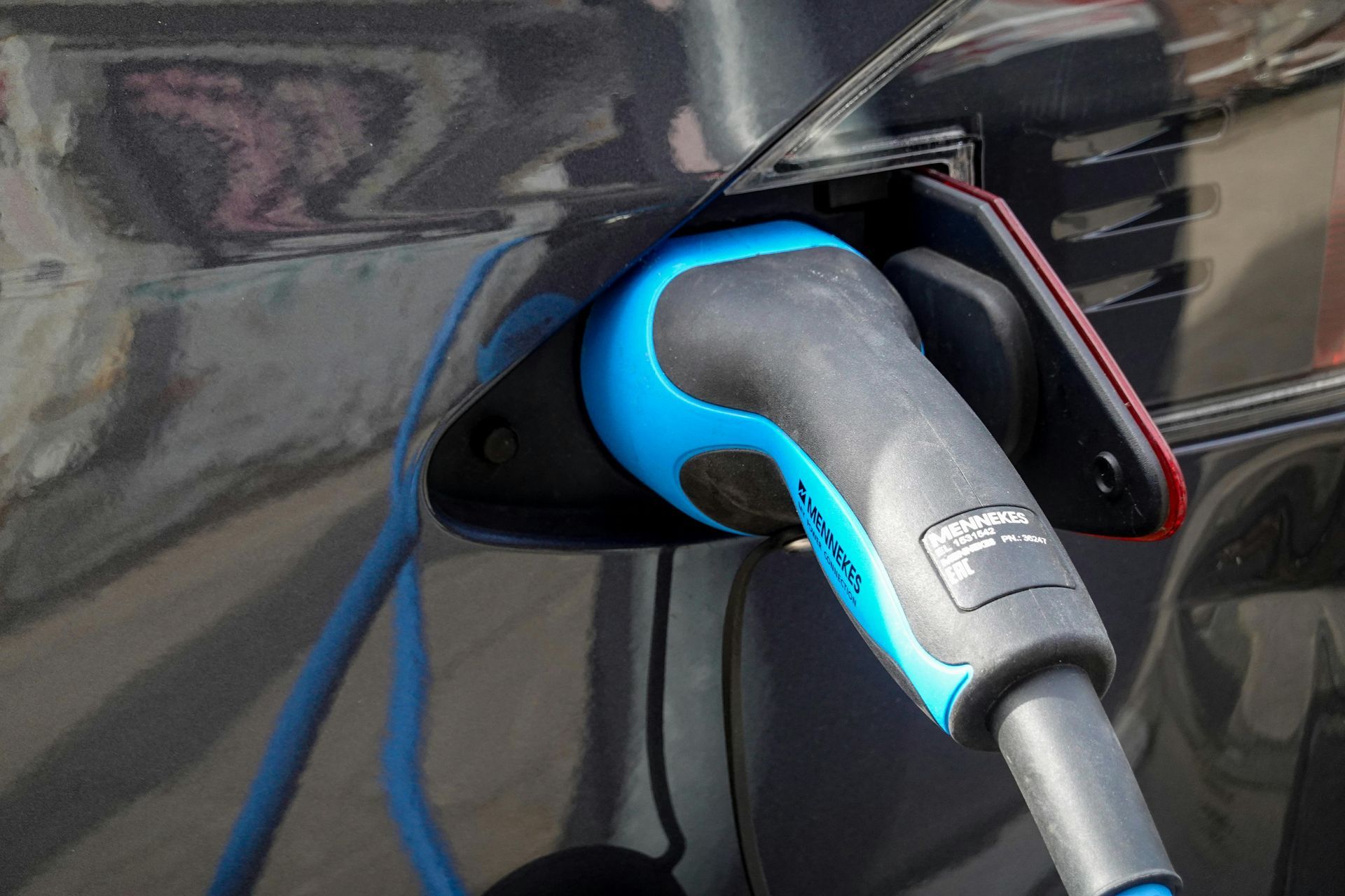 Electric vehicle charging port inspection at First Class HALT