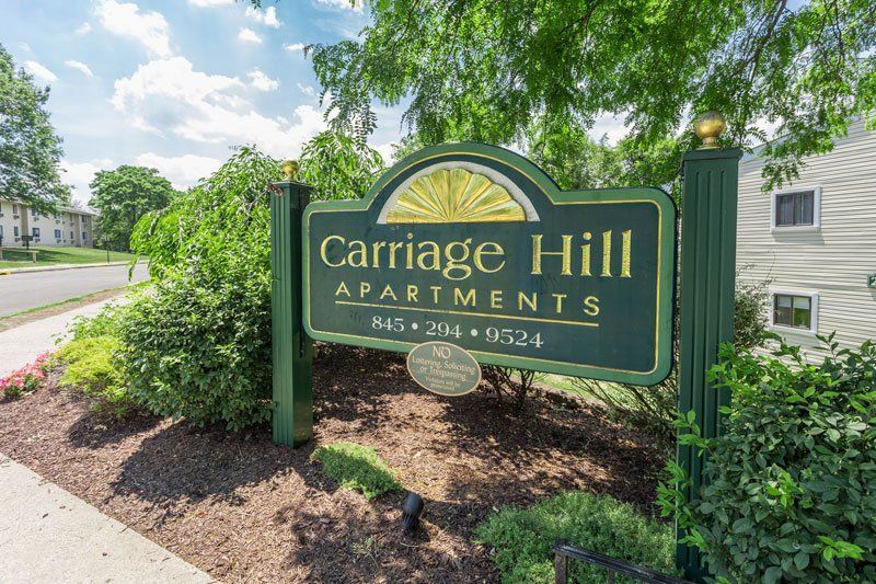 Carriage Hill Apartments sign