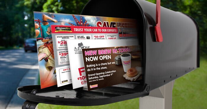 A mailbox with a bunch of flyers in it