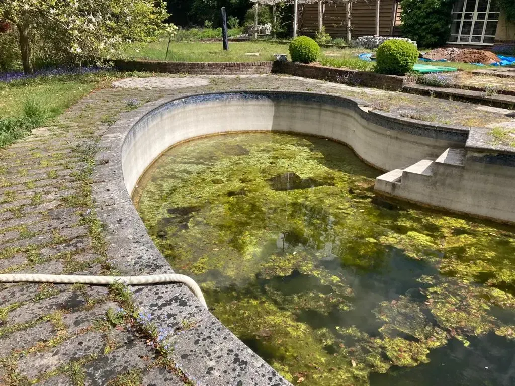 Swimming pool renovation before work started in hampshire
