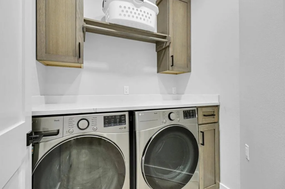Laundry Room in custom Port Aransas home by Innovo Residential