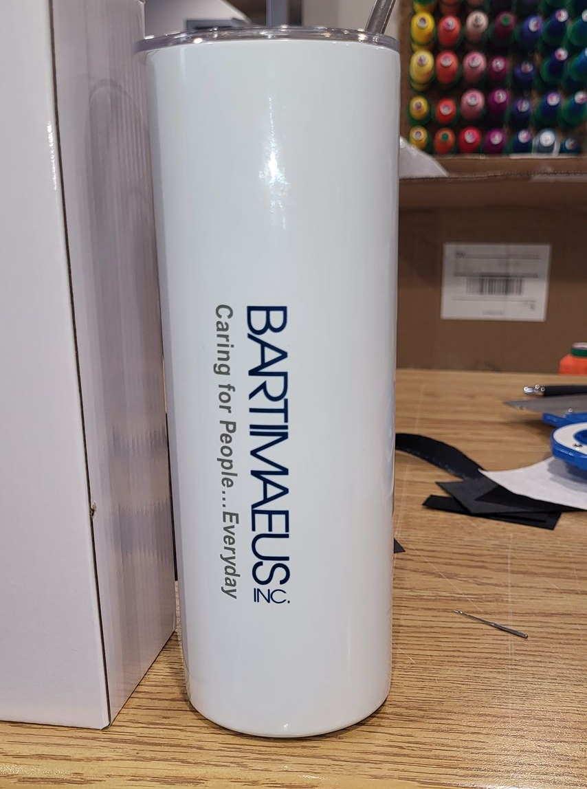 White Bartimaeus tumbler with logo;