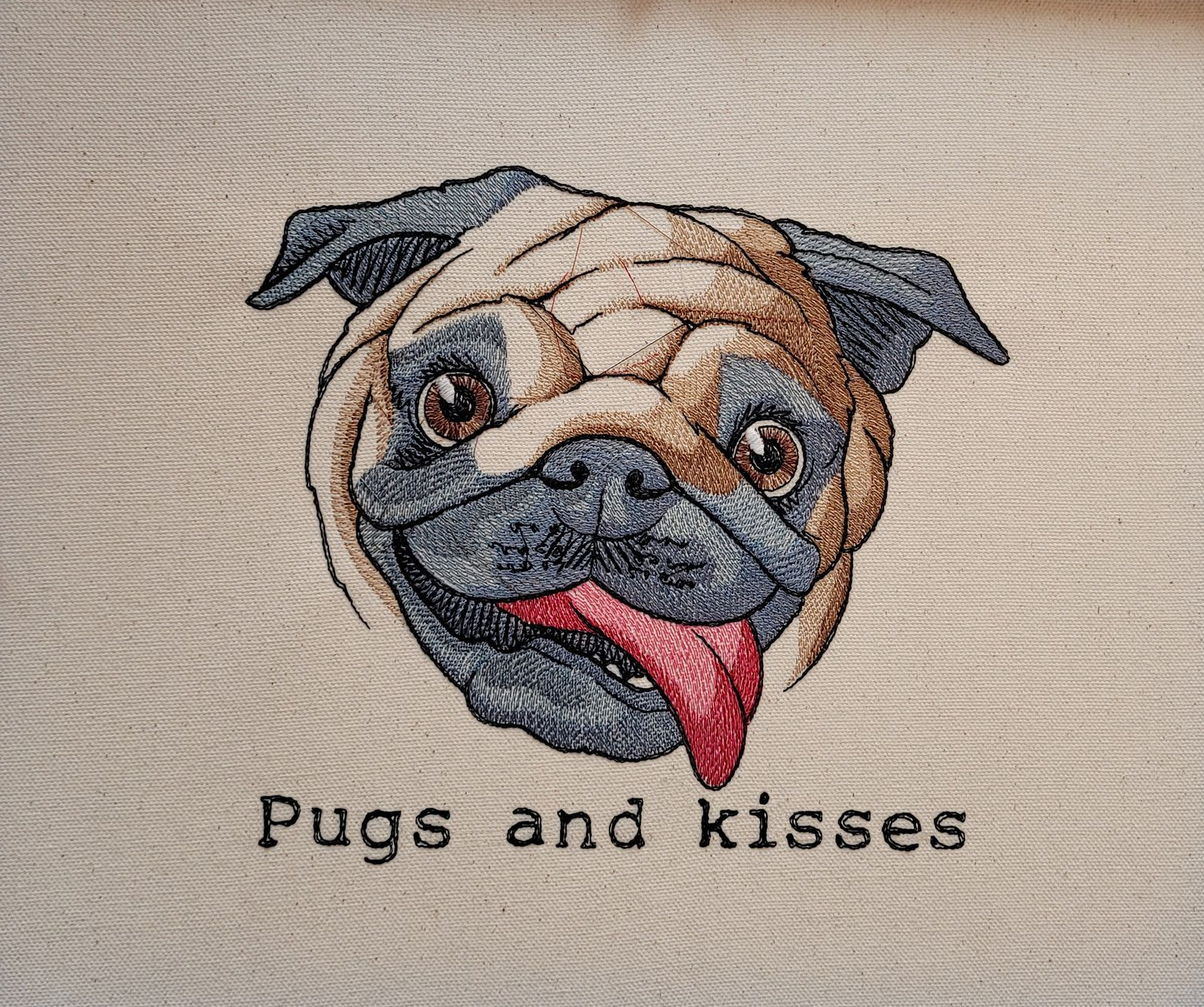 Embroidered pug with brown and grey fur, red tongue, and 