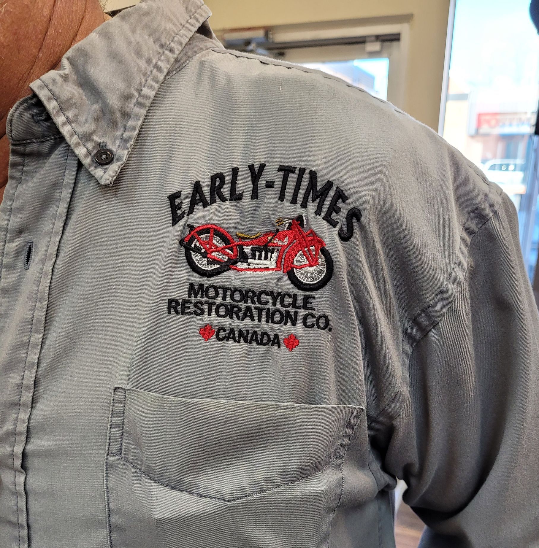 Gray button-down shirt with embroidered