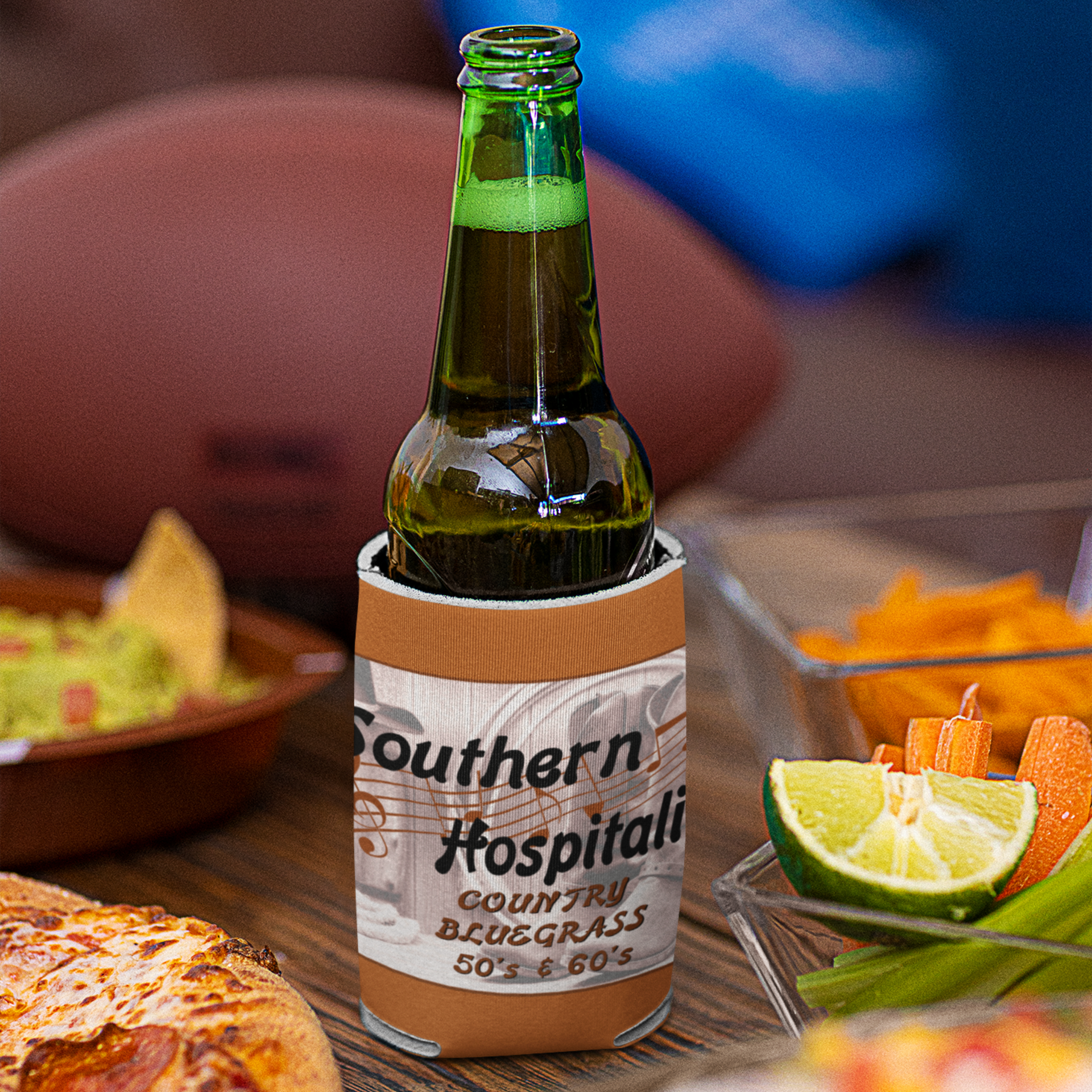Bottle of beer in a koozie labeled