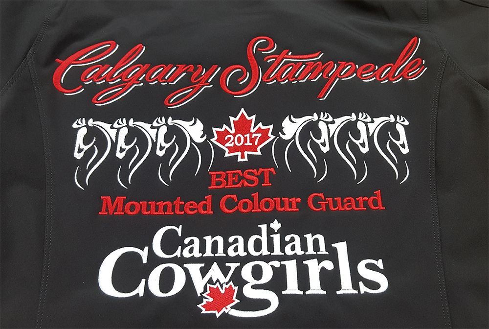 Black jacket with Calgary Stampede text and horse silhouette logo, 
