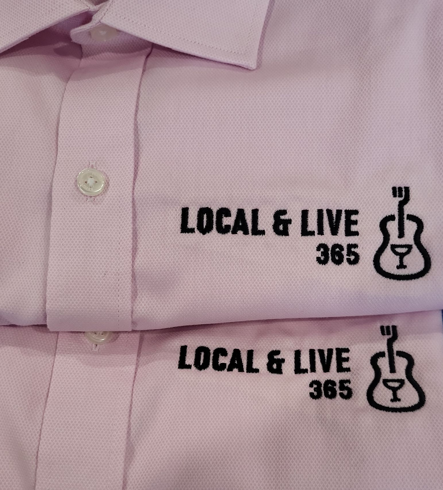 Two pink polo shirts with 