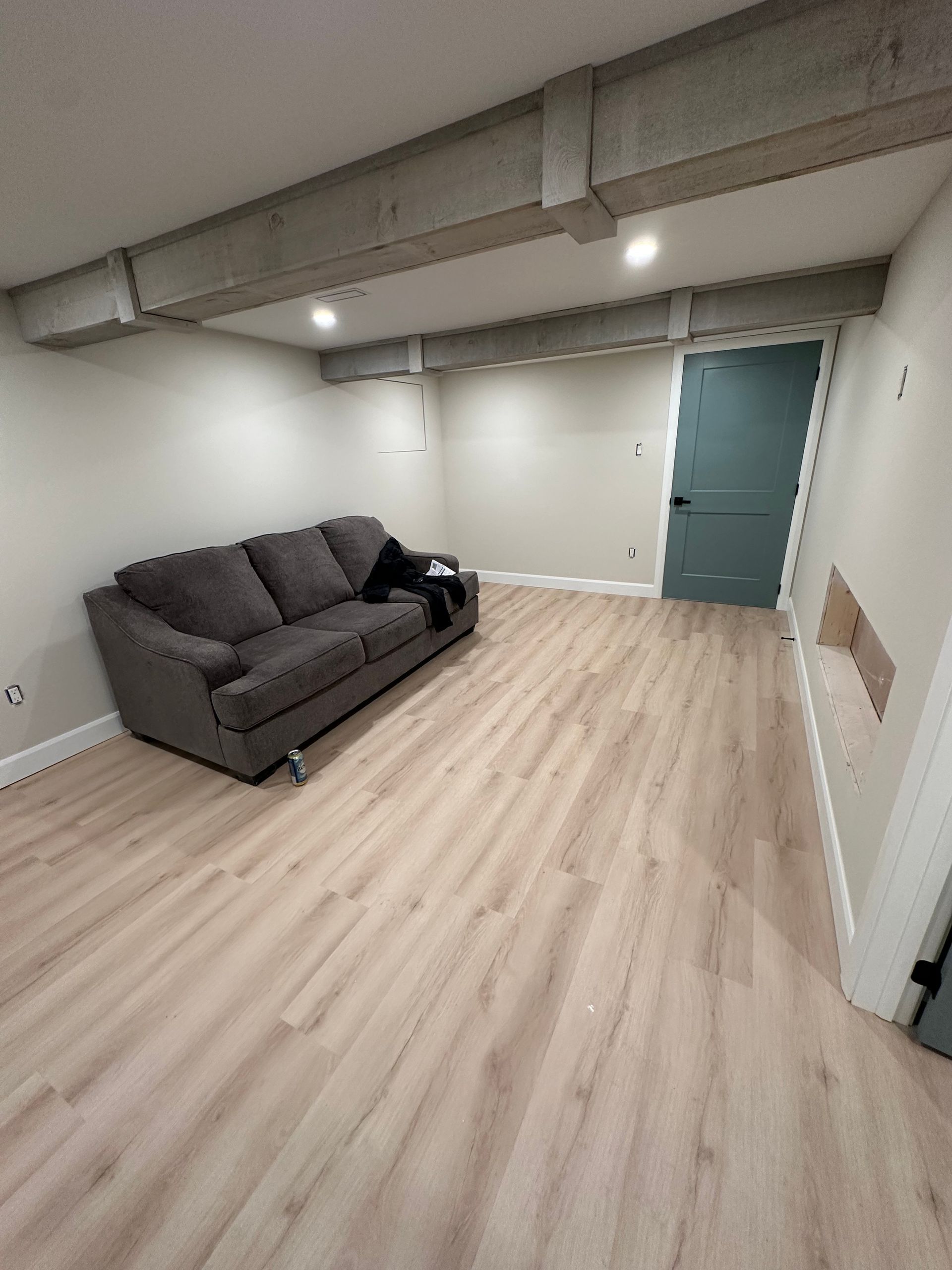 There is a couch in the middle of the room.