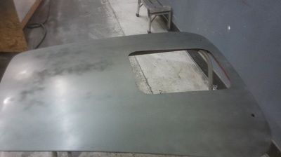 A piece of metal with a hole in the middle is sitting on a table