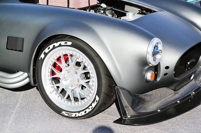 A close up of a toyo tire on a car