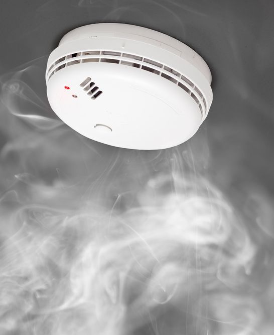 A White Smoke Detector With Smoke Coming Out Of It — Steve Mason Electrical In Port Macquarie, NSW 