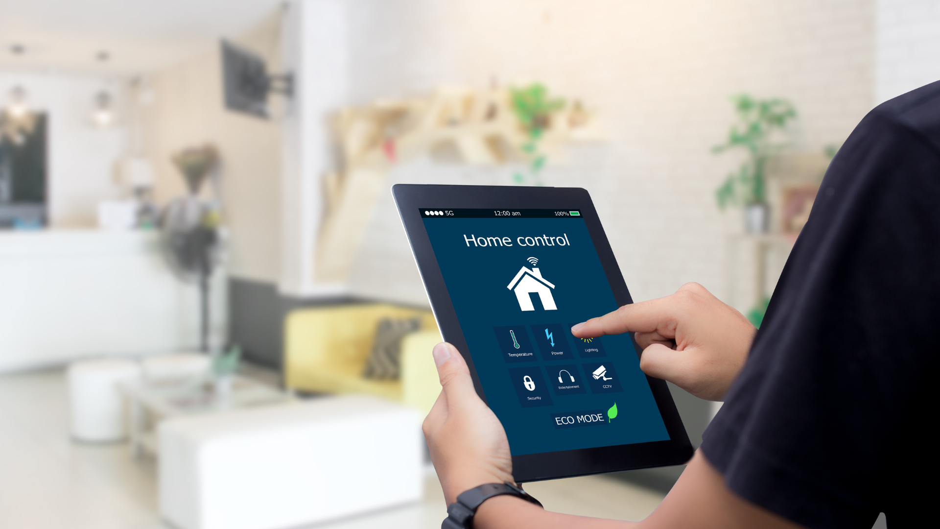 Hand pressing glowing blue digital interface with gears and business icons