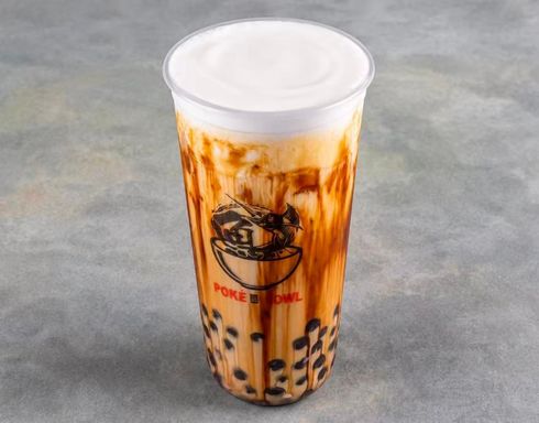 Orange boba drink in a clear cup with ice and black pearls, branded Poké Bowl logo.