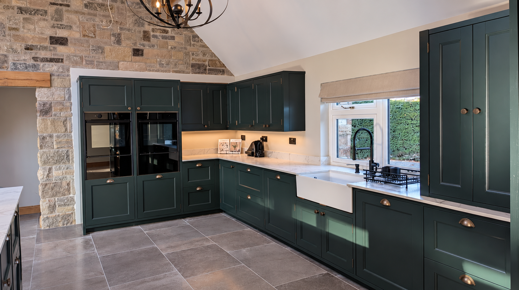 Professionally sprayed Howdens kitchen finished in a custom Little Greene colour